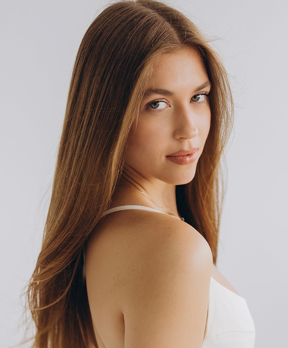 Portrait of a woman with long, flowing hair.