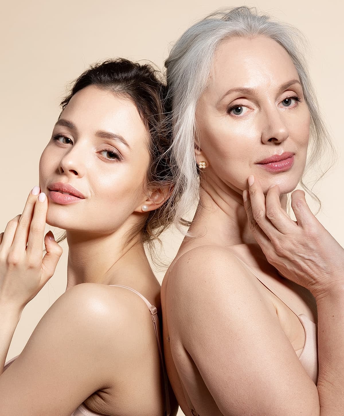 Two women showcasing beauty and elegance together.