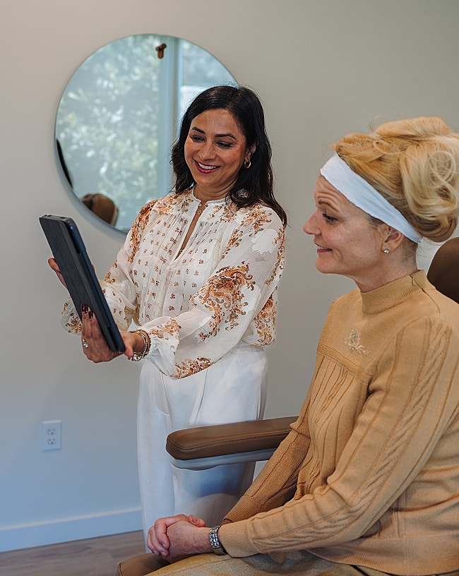 Consultation between a doctor and patient in clinic.