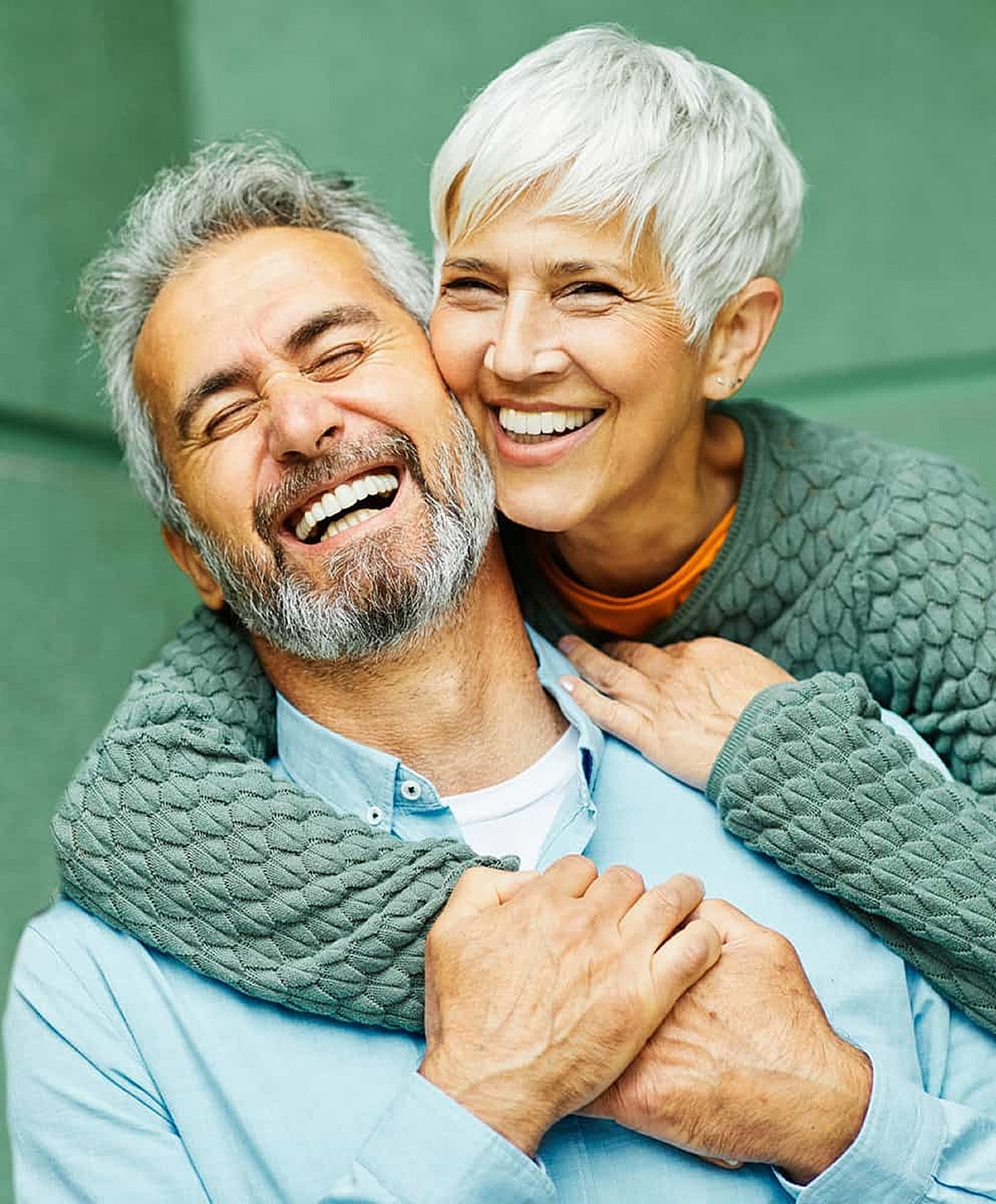 Happy older couple sharing a joyful moment.