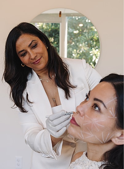 Beauty treatment in a modern salon setting.