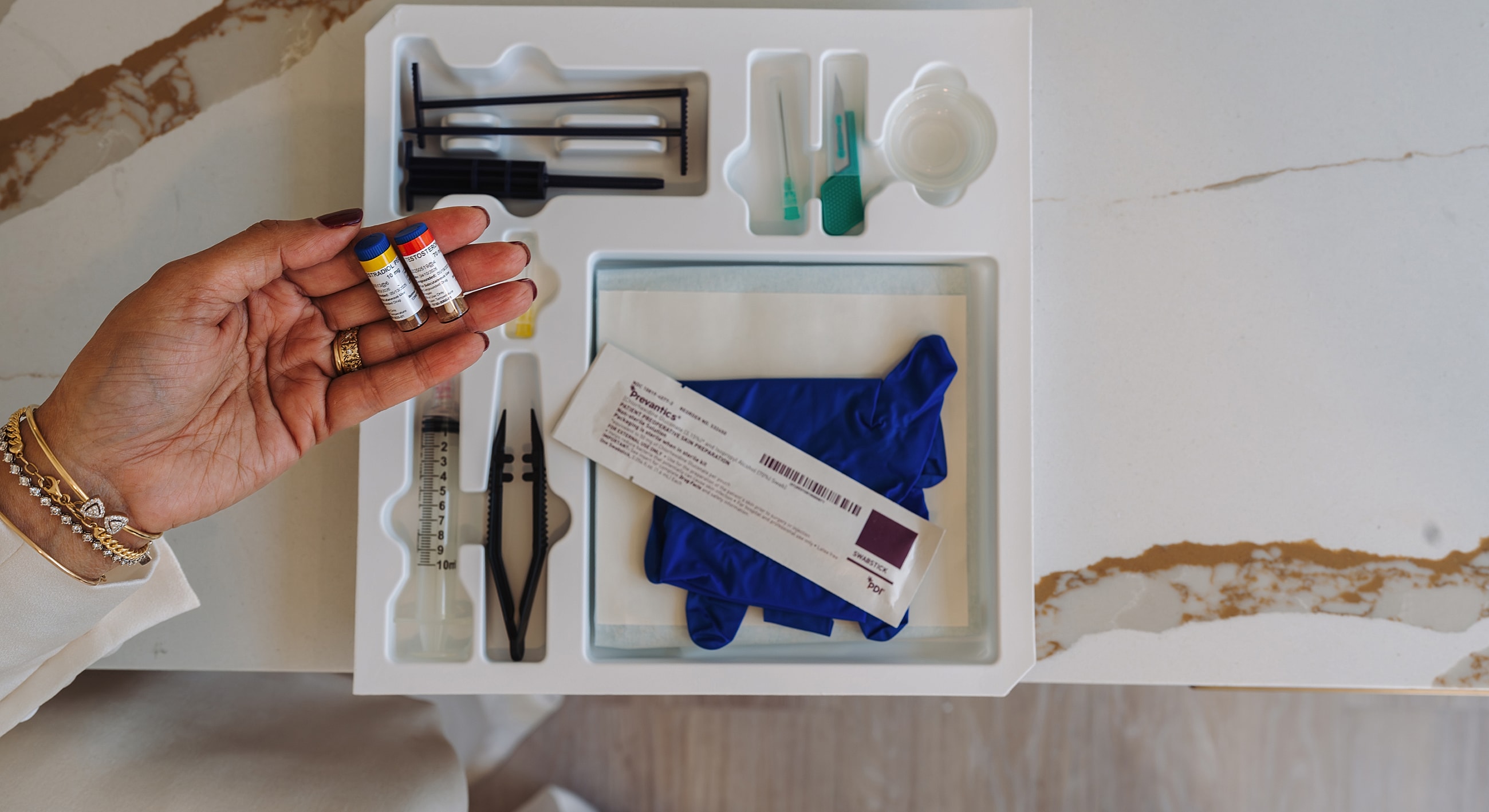 Medical kit with vials and syringes.
